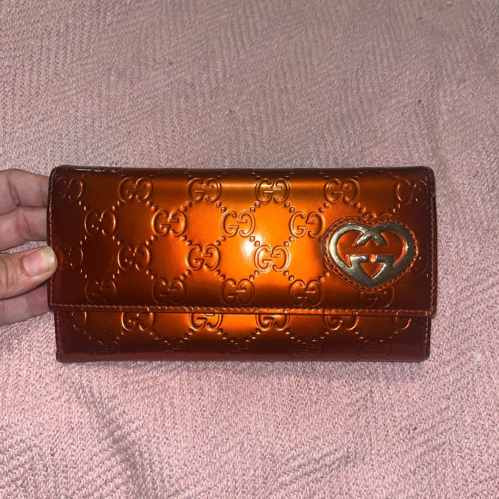 Gucci Metallic Orange Embossed Clutch